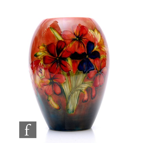 76 - Walter Moorcroft - A vase of ovoid form, flambe decorated in the Spring Flower pattern, impressed fa... 