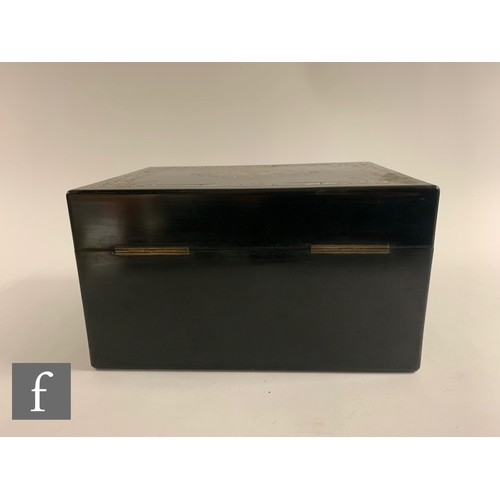 65 - A silver plated and clear cut glass travelling vanity box, the ebonised case with inlaid abalone she... 