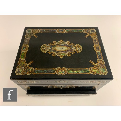 65 - A silver plated and clear cut glass travelling vanity box, the ebonised case with inlaid abalone she... 