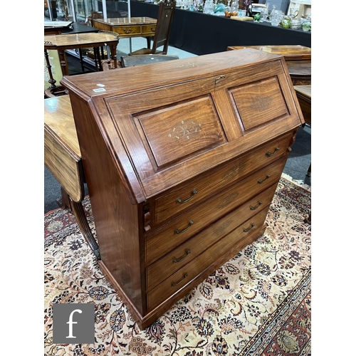 590 - A 20th Century Eastern hardwood bureau, the fitted interior enclosed by a fall inlaid with floral br... 