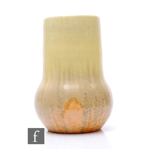 120 - Ruskin Pottery - A crystalline vase of swollen and tapered form, tonal yellow over orange streaked g... 