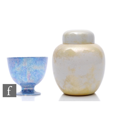 126 - Ruskin Pottery - A ginger jar and cover of ovoid form, faded yellow lustre glaze, impressed marks an... 