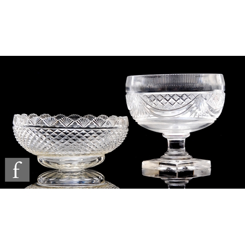 308 - An Anglo Irish clear crystal glass pedestal bowl of ovoid form, the body with heavily cut swag and d... 