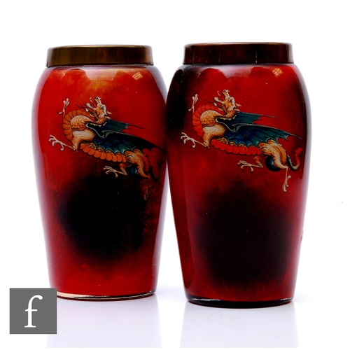 372 - A pair of Art Deco Stourbridge DG Ware vases, each double walled and painted with flying dragons aga... 