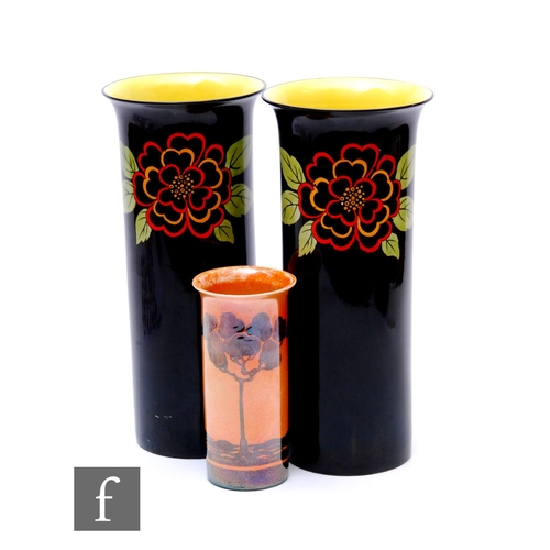 29 - A pair of Hollinshead & Kirkham, H & K Tunstall Art Deco hand painted vases of sleeve form w... 