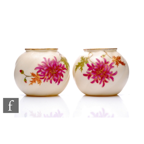 153 - A pair of Grainger & Co Royal China Works vases, of wrythen spherical form, decorated with chrys... 