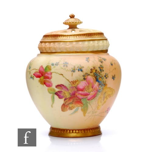 165 - A Royal Worcester blush ivory pot pourri jar and cover, circa 1897, of lobed form with reticulated c... 