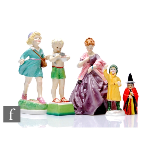 198 - A collection of Royal Worcester figures, to include 'Thursday's Child Has Far to Go', height 19cm, m... 