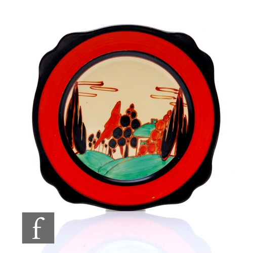 170 - Clarice Cliff - Red Trees & House - A Leda shape plate circa 1930, hand painted with a stylised ... 