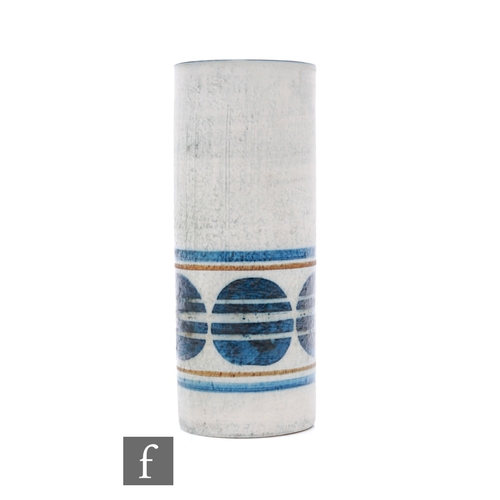 753 - Linda Hazel - Troika Pottery - A cylinder vase, decorated with a band of tri-sected blue circles bet... 