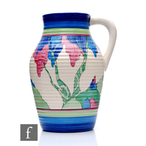 185 - Clarice Cliff - Rudyard - A single handled Lotus jug circa 1932, hand painted with a stylised tree l... 