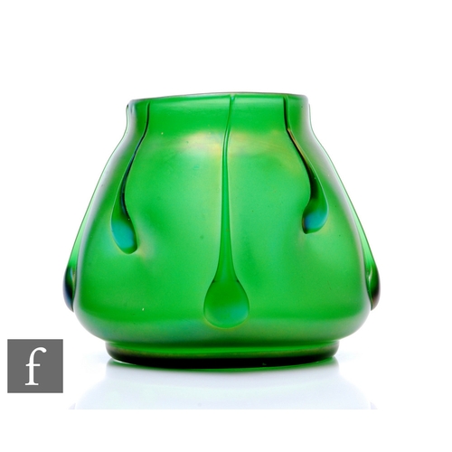 12 - Loetz - An early 20th Century glass vase of ovoid dimpled form with drawn collar, iridescent green g... 