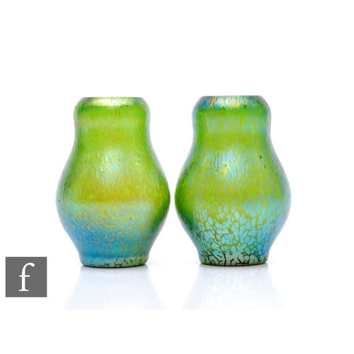 13 - Loetz - A pair of early 20th Century Papillion vases of baluster form, mottled iridescence over gree... 