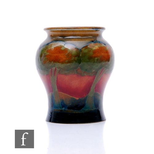 85 - William Moorcroft - Eventide - A small inverse baluster form vase, circa 1925, tiubeline decorated w... 