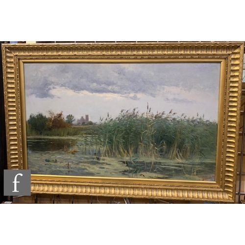 94 - FREDERICK WILLIAM NEWTON WHITEHEAD (1853-1938) - A river scene with reed bed and a church in the dis... 