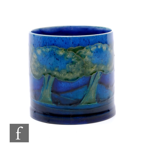 91 - William Moorcroft - Moonlit Blue - A preserve jar, circa 1925, of cylindrical form, tubeline decorat... 