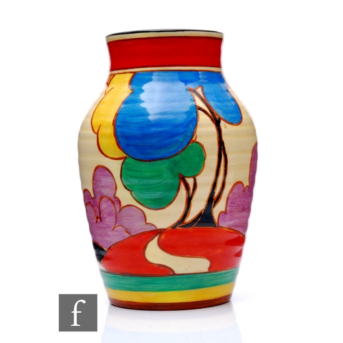 249 - Clarice Cliff - Blue Autumn - An Isis vase circa 1930, hand painted with a stylised tree and cottage... 