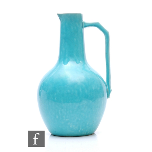 14 - Christopher Dresser - Samuel Lear - An Aesthetic Movement art pottery jug, of bulbous shouldered for... 