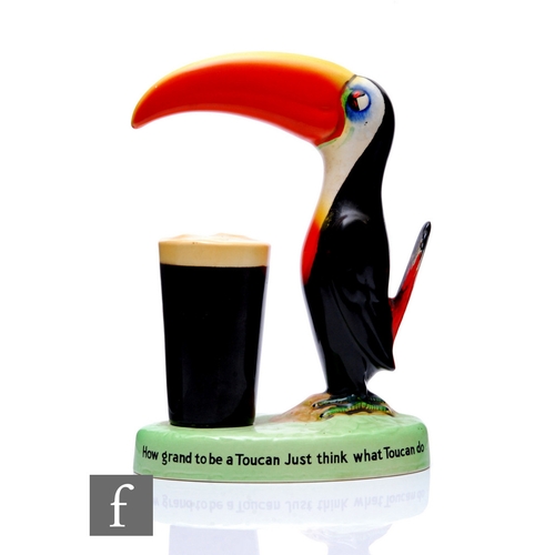 591 - Carlton Ware Ltd - Guinness Advertising - A pottery lamp base, modelled as a Toucan standing over a ... 