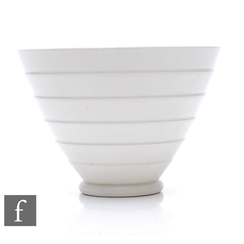 593 - Keith Murray - Wedgwood - A Moonstone conical bowl, relief moulded with overlapped concentric bands,... 