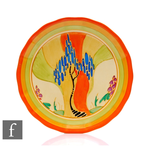 261 - Clarice Cliff - Windbells - A circular wave edge plate circa 1933, hand painted with a stylised tree... 