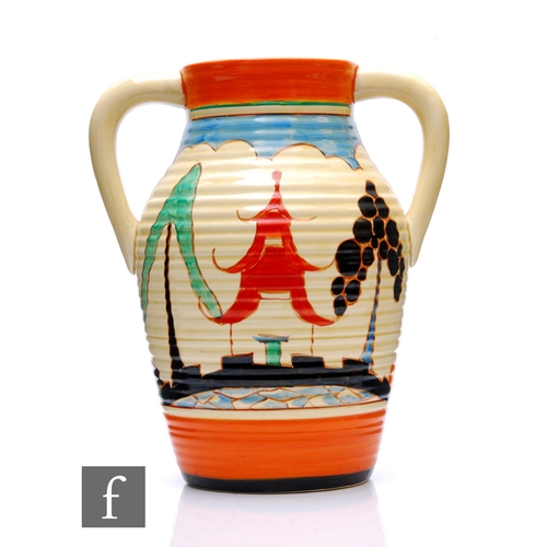 271 - Clarice Cliff - Kew - A double handled Lotus jug circa 1932, hand painted with a Pagoda to a garden ... 