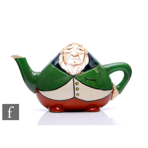 618 - Frederick Rhead - Foley Intarsio - A teapot and cover, modelled as Paul Kruger, printed marks, no.32... 