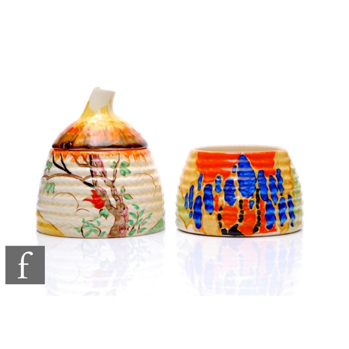 279 - Clarice Cliff - Spire - A small size Bee Hive honey pot circa 1943, hand painted with a stylised lan... 