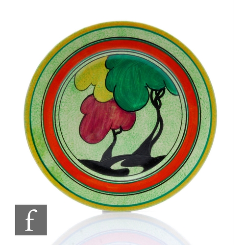 304 - Clarice Cliff - Green Autumn (Cafe au Lait) - A large circular plate circa 1930, hand painted with a... 