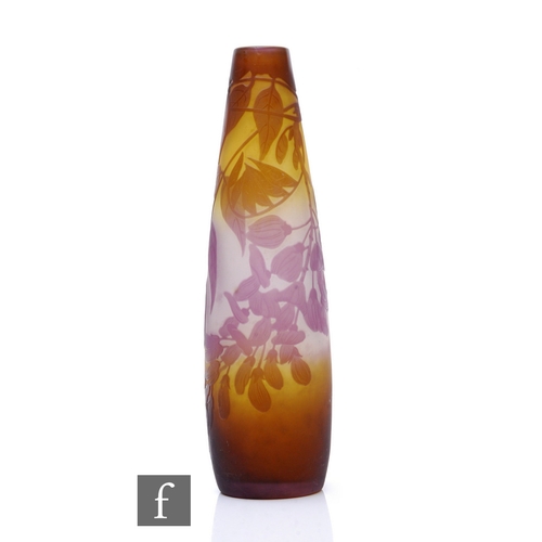 40 - Emille Galle - A cameo glass vase circa 1900, of tapered sleeve form cased in purple over a graduate... 