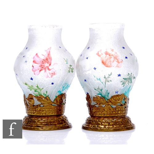 42 - In the manner of Mont Joye & Cie - A pair of clear crystal glass vases circa 1900, of shouldered... 