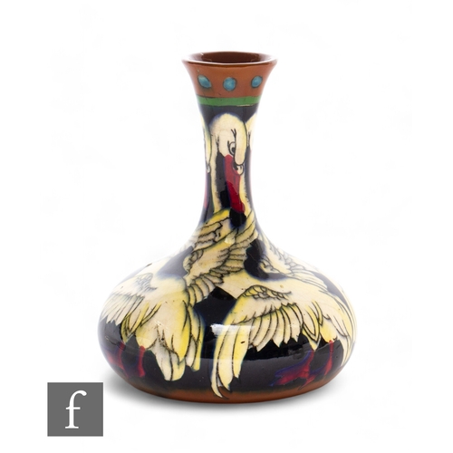 627 - Frederick Rhead - Wileman & Co - A Foley Intarsio vase of compressed bottle form with high drawn... 