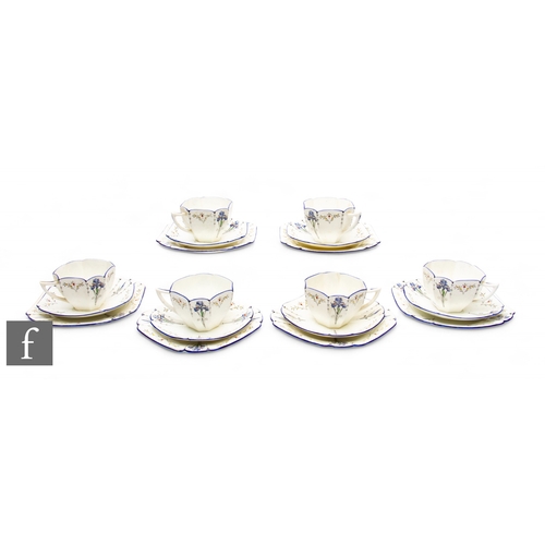 639 - Shelley - An Art Deco Queen Anne shape Blue Iris pattern part tea set of octagonal form, alternating... 