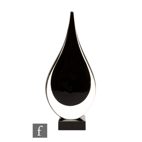1181 - Unattributed maker - A contemporary glass sculpture of teardrop form, the black core cased in clear ... 
