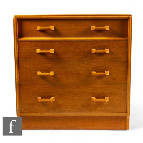 910 - G Plan - A 1950s 'Brandon E Gomme' oak chest of drawers, with four long drawers with angular handles... 