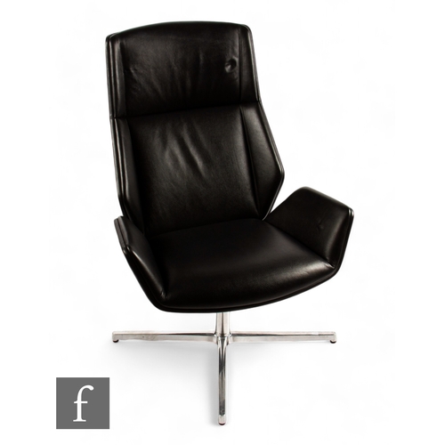 1289 - Boss Design - A 'Kruze' high back lounge chair, black padded leather with four star polished alumini... 