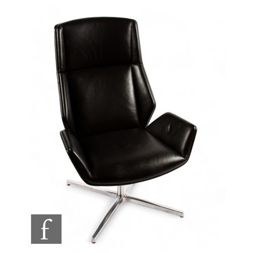 1290 - Boss Design - A 'Kruze' high back lounge chair, black padded leather with four star polished alumini... 