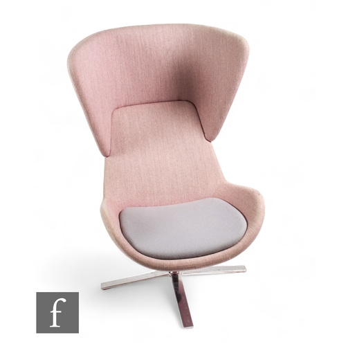 1295 - Orangebox - A soft fabric LM24 highback armchair, in light purple/grey contrasting colour, on four s... 