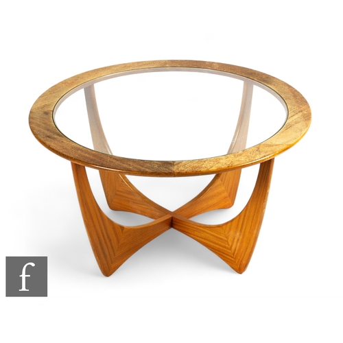 912 - Victor Wilkins for G-Plan - An 'Astro' teak coffee table, with central glass panel, height 46cm, dia... 