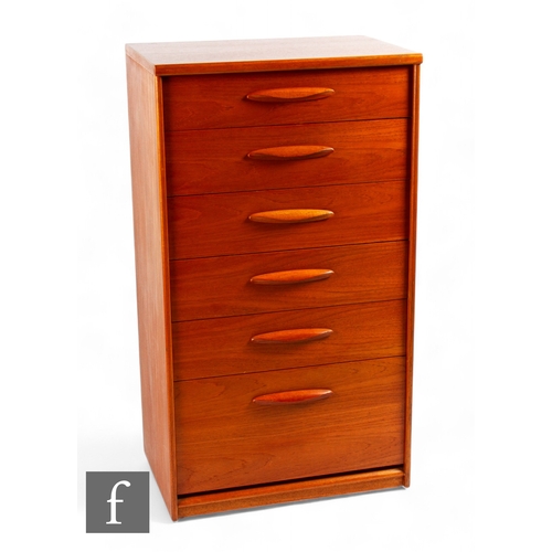 916 - Victor Wilkins for G-Plan - A mid Century teak 'Fresco' tallboy, with six drawers, raised on interna... 