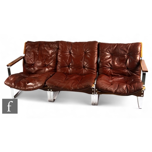 927 - In the manner of Westnofa, Norway - A mid century chrome and rosewood modular suite, with three indi... 