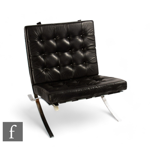 928 - After Mies Van Der Rohe - A mid Century 'Barcelona' chair, the chrome frame, with black leather upho... 