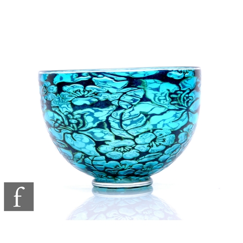 1144 - Timothy Harris - Isle of Wight - A contemporary glass bowl of footed form, pale turquoise ground ove... 