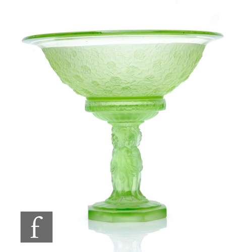 672 - Muller & Co - An Art Deco table centrepiece bowl and stand, the sand moulded with putti, the bow... 