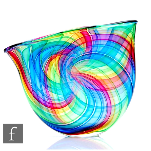 1162 - Bob Crooks - A contemporary studio glass Spectrum Pi bowl of compressed form, with clear cased multi... 