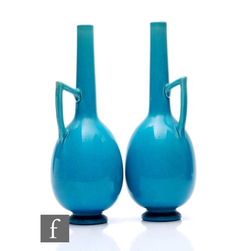 1132 - After Dr Christopher Dresser - Burmantofts - A pair of late 19th Century bottle vases of footed ovoi... 