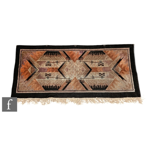 678 - Unattributed maker - A 1930s Art Deco rectangular velveteen wall hanging with a geometric design in ... 