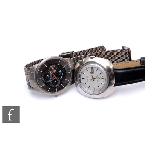 1339 - Seiko - A 1970s Seiko Bellmatic watch with silver dial and black leather strap and a Skagen Denmark ... 