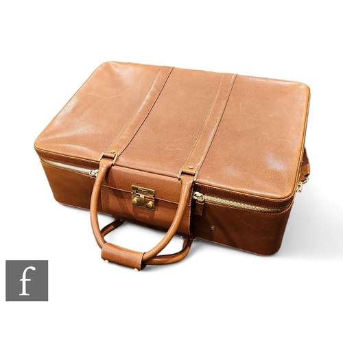 1343 - Salvatore Ferragamo - A hard case suitcase, all in tan leather, with gold tone hardware and detachab... 