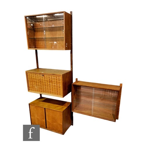 931 - Poul Cadovius - A mid Century Danish 'Royal System' teak wall unit, with upper glazed section, above... 